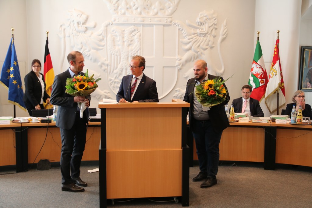 Die neuen Ratsmitglieder Marc Bohn (l.) und Hayda Dikme (r.), beide SPD.